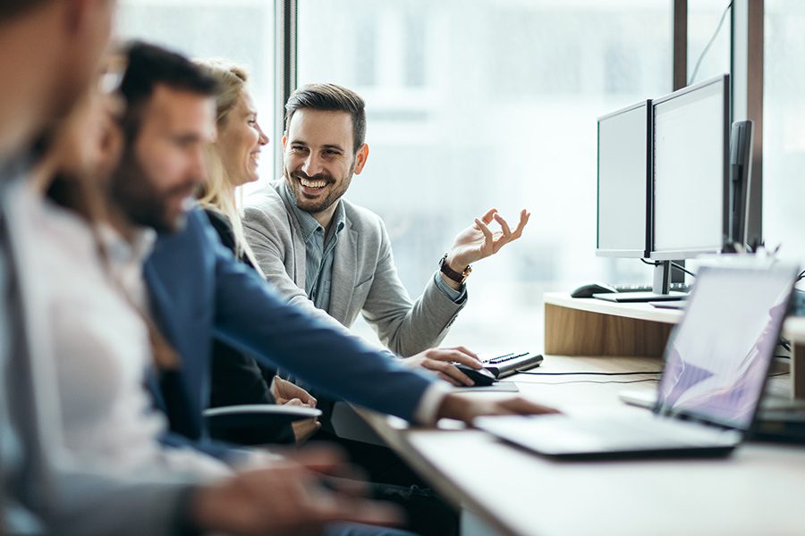 About Our Agency - Picture of Business People Working Together in the Office